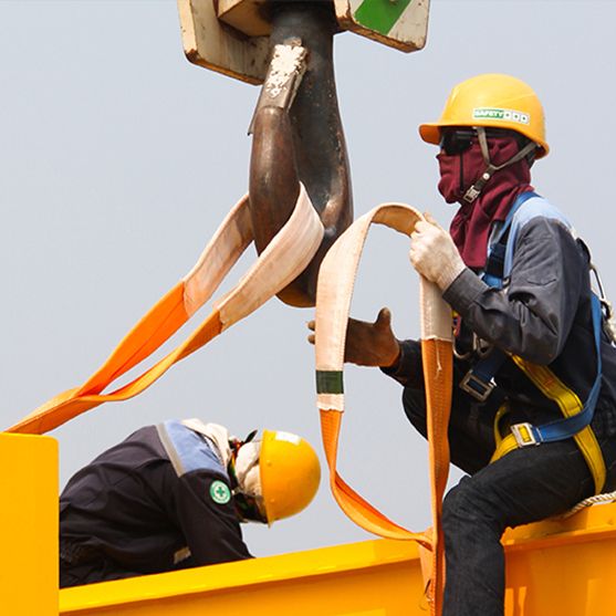 men operating a crane